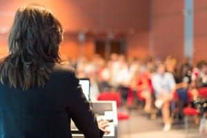 http://www.dreamstime.com/stock-photo-business-woman-lecturing-conference-audience-lecture-hall-image42291480