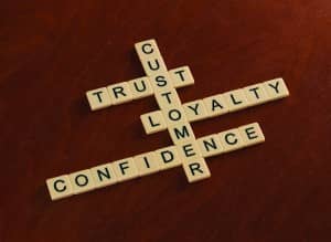 http://www.dreamstime.com/royalty-free-stock-images-crossword-puzzle-words-trust-loyalty-confidence-customer-concept-ivory-tiles-capital-letters-mahogany-board-image92581359