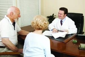 http://www.dreamstime.com/royalty-free-stock-photography-doctor-discussing-treatment-plan-image13080367