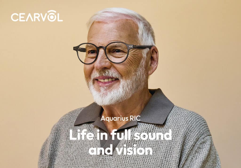 Cearvol Aquarius hearing glasses worn by a man with a white beard
